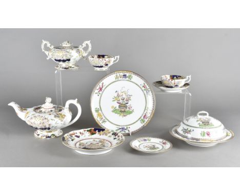 A 19th Century Staffordshire part tea service, of melon shape, painted with floral pattern comprising a sugar bowl and cover,