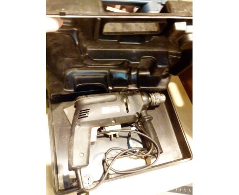 Two boxed power tools including a drill and sander