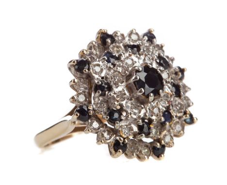 SAPPHIRE AND DIAMOND CLUSTER RING,set with round sapphires and round brilliant cut diamonds totalling very approximately 0.60