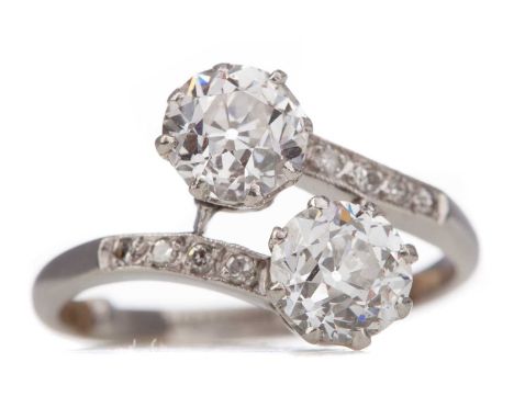 DIAMOND TWO STONE RING,set with two Old European cut diamonds totalling approximately 1.75 carats, on diamond shoulders, in p