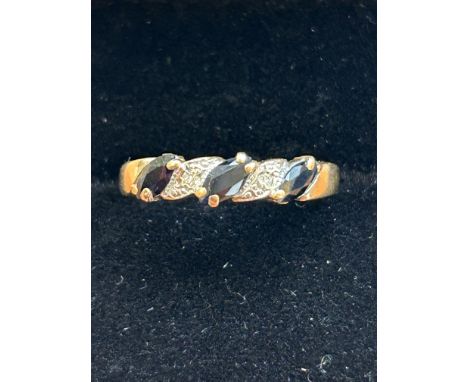 9ct Gold ring set with Sapphires and Diamonds size- K weight- 1.2g