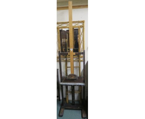 A large artists easel, 227cm high Condition Report: Available upon request