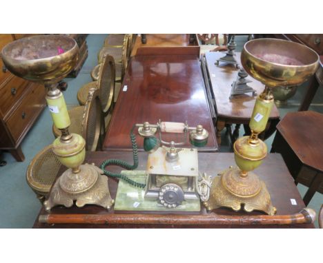 A pair of brass and onyx candle holders, onyx telephone and a walking stick (4) Condition Report: Available upon request