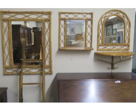 A bamboo ladder, three cane wall mirrors and a wall shelf (5) Condition Report: Available upon request