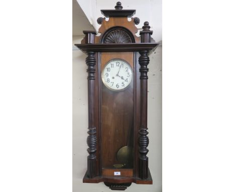 A mahogany wall clock Condition Report: Available upon request