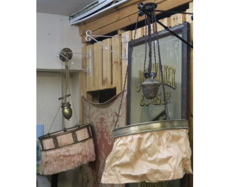 A brass rise and fall light and another rise and fall light (2) Condition Report: Available upon request