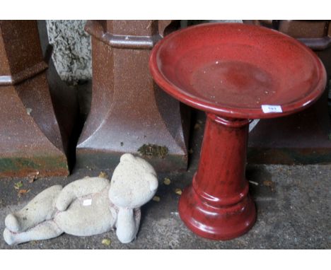 A Ceramic bird bath and a garden ornament (2) Condition Report: Available upon request