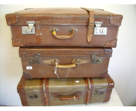 Set of three vintage suitcases 