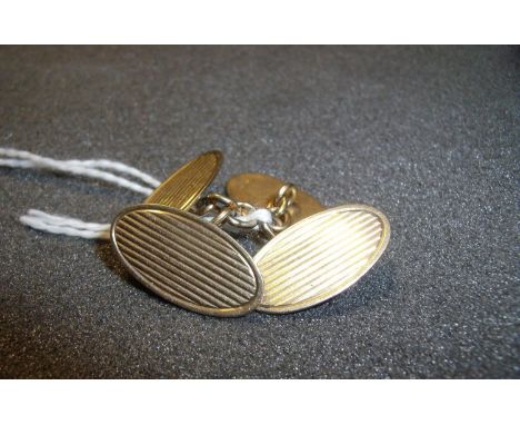 Pair of 9ct gold oval chain link cufflinks with engine turned detail 