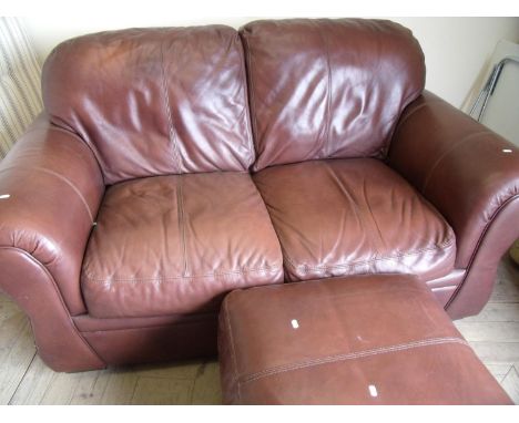 Quality brown leather two seat sofa and matching footstool (sofa width 175cm) 