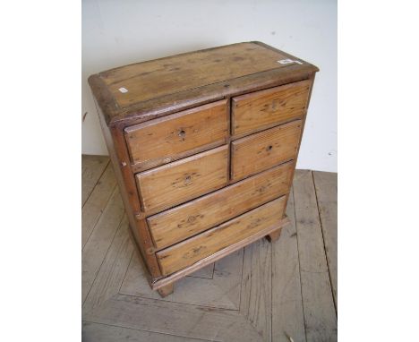 Victorian beech dwarf chest of four short above two long drawers on raised bracket supports (50cm x 25cm x 67cm) 