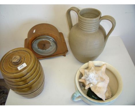 1920s Smiths mantel clock, a large shell, chamber pot, oil lamp, twin handled vase and a treacle glaze Powell of Bristol barr