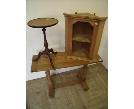 Light oak rectangular occasional table on barley twist column supports, a two tier pine corner unit and a mahogany wine type 