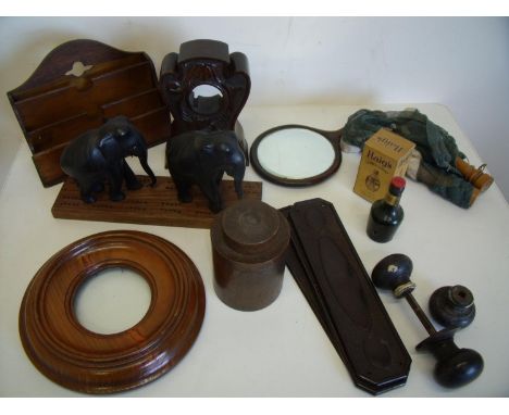 Carved oak pocket watch stand, wooden letter rack, turned wood picture frame, ebony elephant, cribbage board, bakelite style 