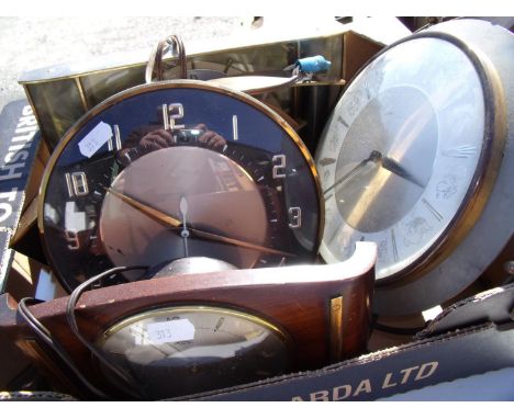 1950's Metamec mains electric mantle clock, the dial set with the signs of the zodiac and three other metamec mains electric 