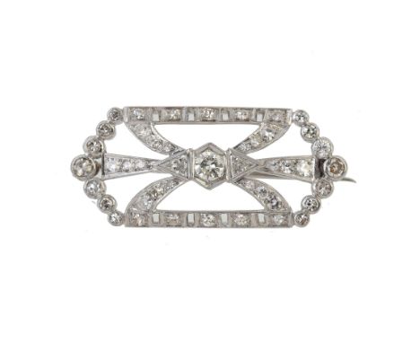 A mid 20th century diamond panel brooch, the pierced panel set with eight cut, brilliant cut and triangular cut diamonds, app