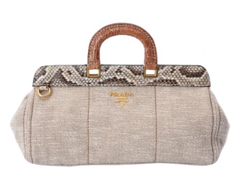 Y Prada, a beige fabric and python handbag, the beige woven fabric to brown leather D shaped handles and python trim, with le
