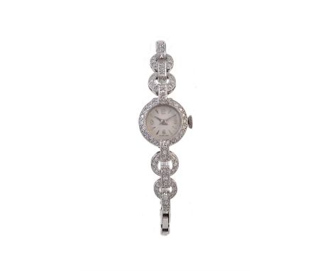 Unsigned,Lady's platinum coloured and diamond cocktail watch, circa 1945Movement: Swiss manual wind, 17 jewelsCase: Platinum 