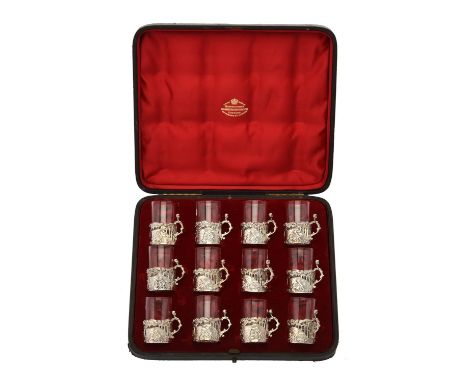 A cased set of twelve Victorian silver mounted liqueur glasses by William Comyns & Sons Ltd., London (1891), Birmingham 1892 