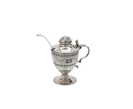 A George III silver urn shaped mustard pot by Richard Crossley, London 1791, with a domed cover, a double scroll handle, the 