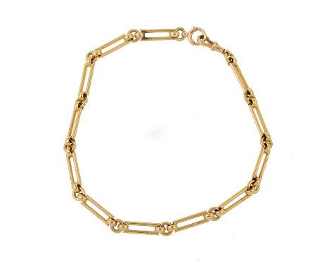 A late 19th century 18 carat gold fancy link Albert chain, the rectangular shaped double tube links interspaced with circular