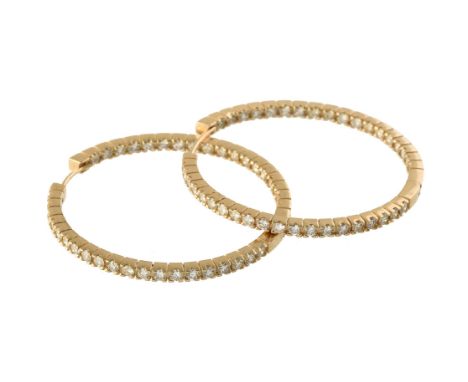 A pair of diamond ear hoops, the hoops set throughout with brilliant cut diamonds, approximately 3.80 carats total, 4.7cm dia