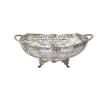 A silver twin handled oblong fruit bowl by Goldsmiths & Silversmiths Co. Ltd., Sheffield 1929, with twin loop handles, a chas