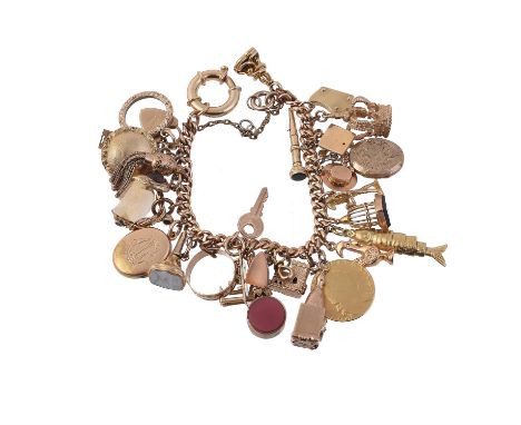 A vintage charm bracelet, the 9 carat gold curb link bracelet suspending various charms, including a George III spade guinea,