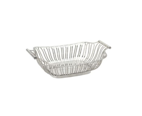 An Edwardian silver oblong pierced bowl by Harrison Brothers & Howson, London 1902, with a reeded border and pierced with loo