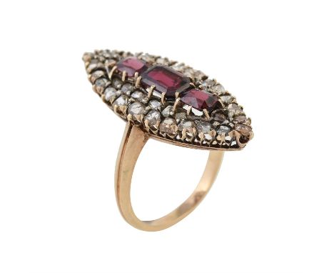 A garnet and diamond navette shaped cluster ring, the mixed cut garnets within a surround of rose cut diamonds, the panel mea