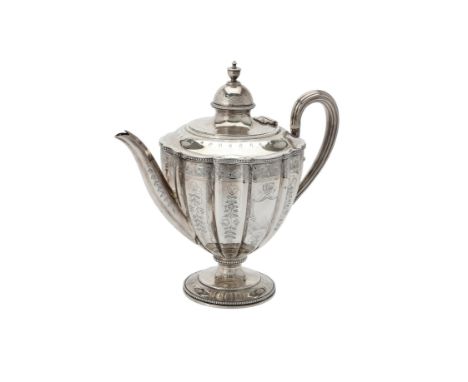 Y A Victorian silver lobed and fluted tea pot by Martin, Hall & Co., London 1874, with an urn shaped finial to the domed cove