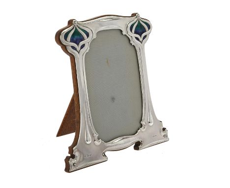 An Art Nouveau silver mounted and enamel shaped rectangular photo frame by William Hutton & Sons Ltd., London 1903, 25.5cm (1