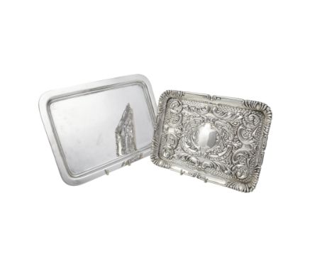 An Edwardian silver oblong toilet tray by J. & R. Griffin, Chester 1905, chased with foliate swags and a shaped circular vaca