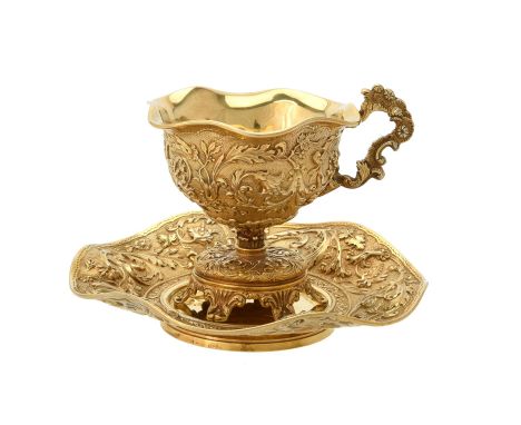 A French silver gilt cup and saucer by François Durand, Pairs circa 1850, the cup with a shaped border, the scroll handle and