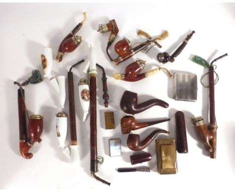 A large group of pipes and smoking related items including a meerschaum pipe, a silver mounted pipe, cheroot holders, a horn 