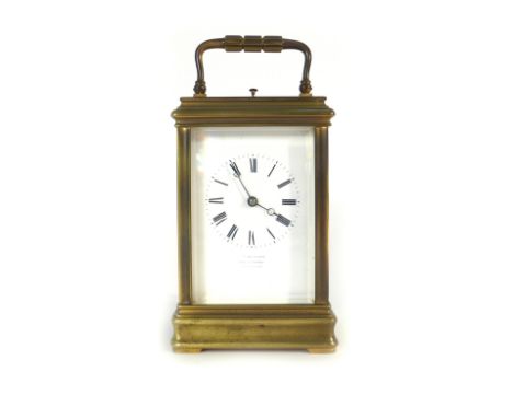A 19th century French carriage clock, the movement striking on a gong with a repeater, the enamelled face named 'George Black