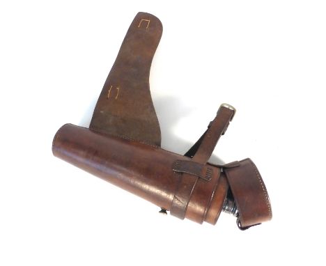 A Victorian brown leather hunting pouch holding a silver mounted glass flask, l. 26 cm   CONDITION REPORT:  Buckle and leathe