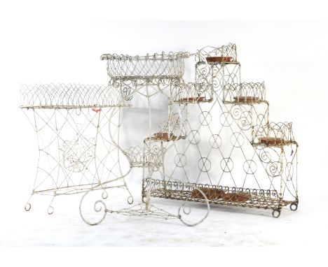 Three white painted wirework garden planter holders CONDITION REPORT: Wear commensurate with age, use and British weather