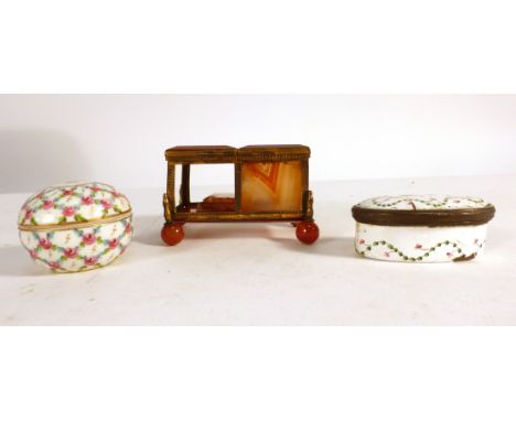 An 18th century enamel patch box of oval form, w. 6 cm, a gilt metal mounted agate trinket box and a small rose decorated sph