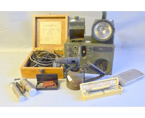 Torch, Navigation Lamp, Two blow Lamps, Razors, Signal Corps Remote Control Unit, Wireless Procedure Training Set,