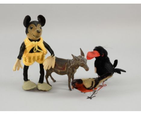 Mickey Mouse toy, felt with wirework limbs Reg no 7506, with Schuco peck Bird, Steiff Hucky Bird and Mule Money box, circa 19