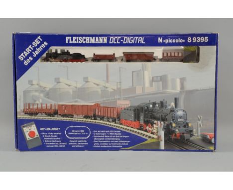 Hornby 'OO' gauge train set, Virgin Trains boxed and two Fleischmann DCC Digital train sets, boxed, (3),