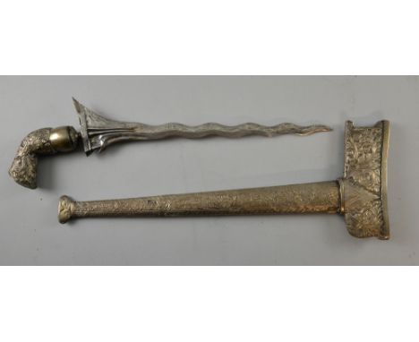 Indonesian Kris with white metal scabbard and handle,