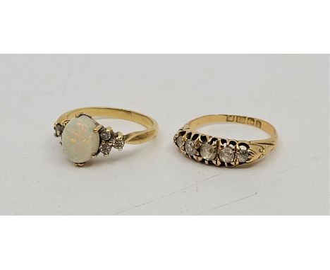 A Victorian 18ct. gold five stone diamond ring, assayed Birmingham 1900, set five graduated old-cut diamonds, size UK K (gros