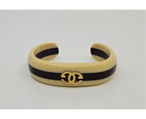 A vintage 1980's composite Gucci cuff bangle, width a maximum 6.9cm.&nbsp;