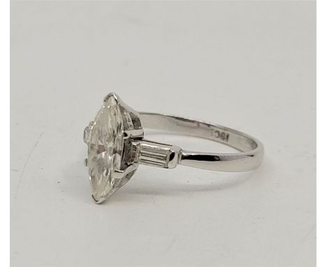 An 18ct white gold and diamond ring, claw set marquise cut diamond to centre (approx. 11mm x 5mm x 3mm, EDW approx. 1.00 cara