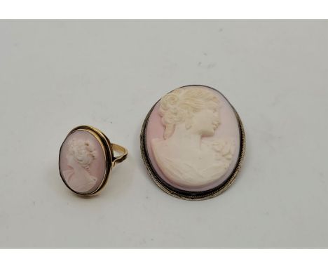 An 18ct. gold and pale pink porcelain cameo ring, size UK L 1/2 (gross weight 4.5g), together with a similar silver mounted p