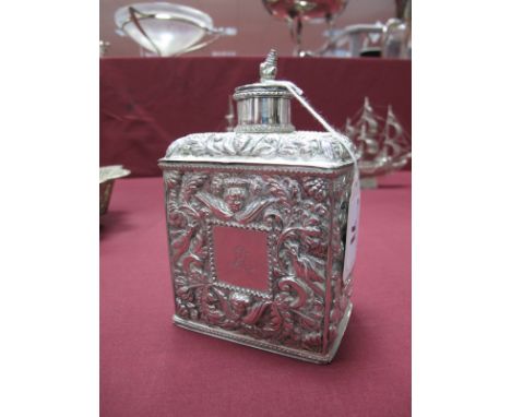 A Continental Tea Caddy, stamped with pseudo Dutch guild marks, of rectangular form profusely detailed in relief with winged 