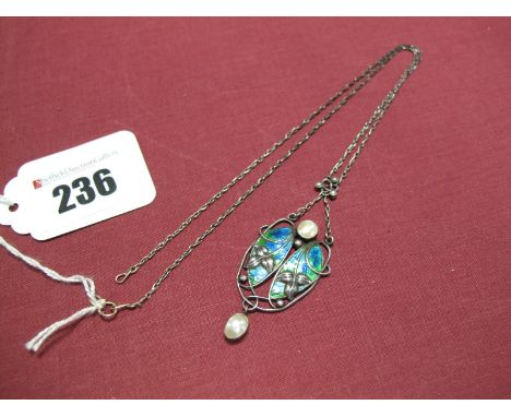 An Art Nouveau Enamel Pendant, of sinuous openwork design, in green and blue enamel, with pearl highlights, on fine chain.