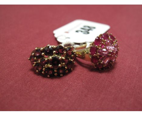 A Modern Ruby Set Circular Cluster Ring, of flowerhead design, claw set throughout; A Modern 9ct Gold Cluster Ring, claw set 